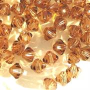 BICONO 4MM LIGHT SMOKED TOPAZ       (ART.5301 SWAROVSKI ROMBETTO)